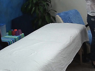 Blonde girl takes off garments and underware slowly and then lies on massage table. Impressive masseur enters the room and this hottie becomes turned on seeing him. The girlie makes a decision to entice him to fuck herЕ