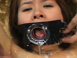 Ai Nananse gives blowjobs  acquires bukkake cumshots to her face  collects cum in a glass and in her mouth and swallows it all up.
