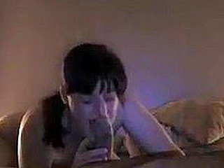 Brunette with a pretty face and nasty look in her eyes acquires to sucking the fattest dick of her life. This babe can't get it in her mouth and focuses her tongue on licking it all around instead!